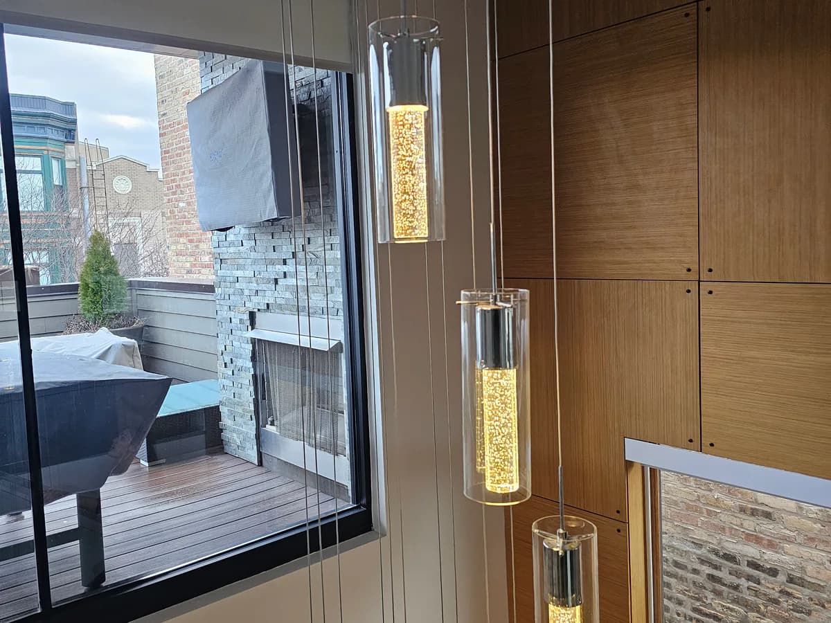 Pendant lights installed above a residential stairwell